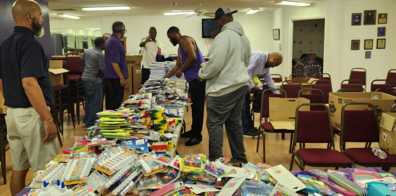 Omegas Provide School Supplies, Haircuts for Local Students
